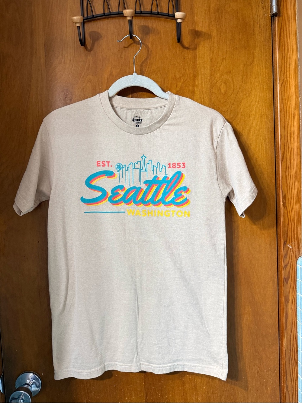 Vintage Beige Seattle Washington Short Sleeve Tee with Multicolor Script